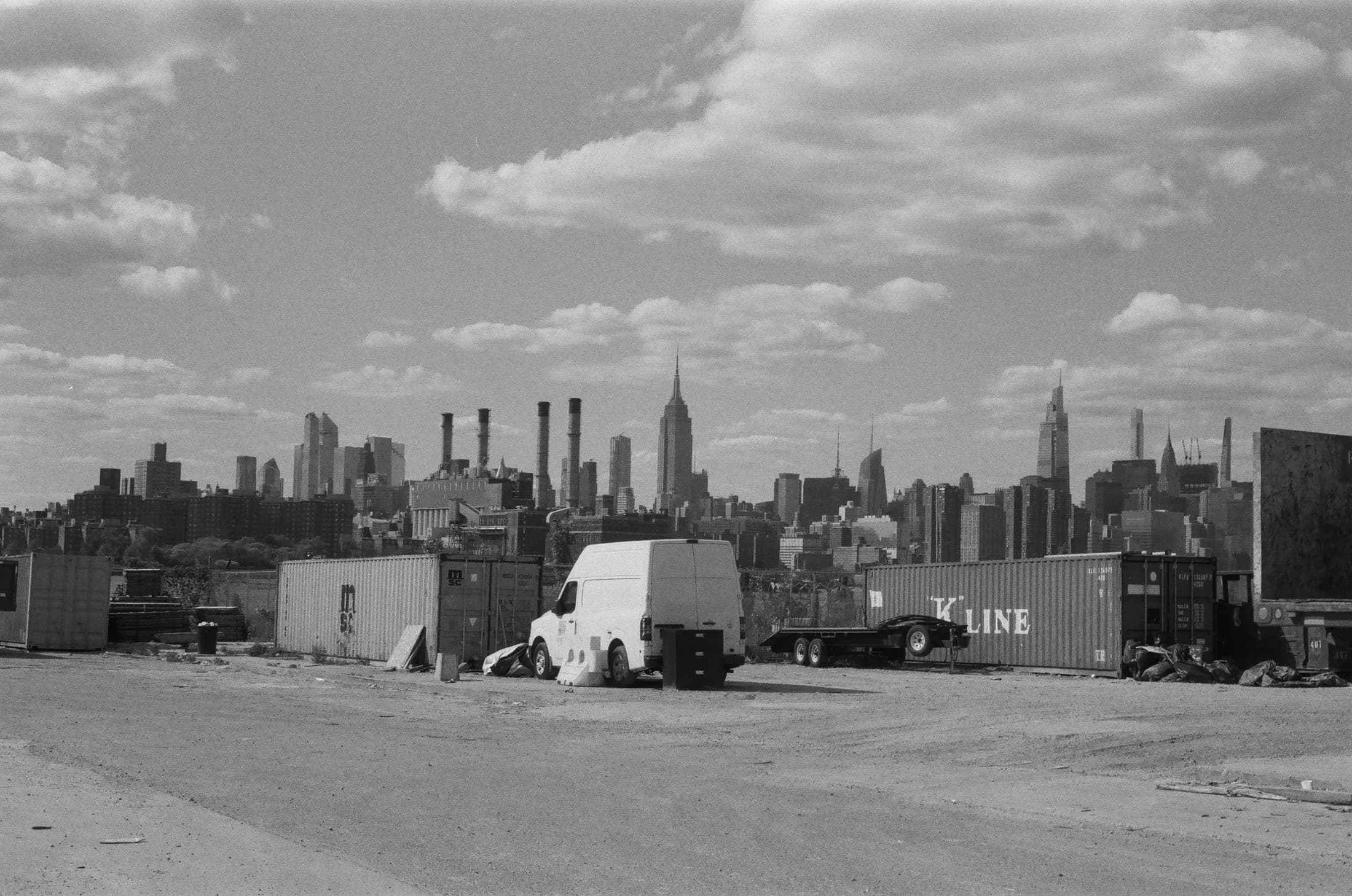 Manhattan skyline seen across a lot
